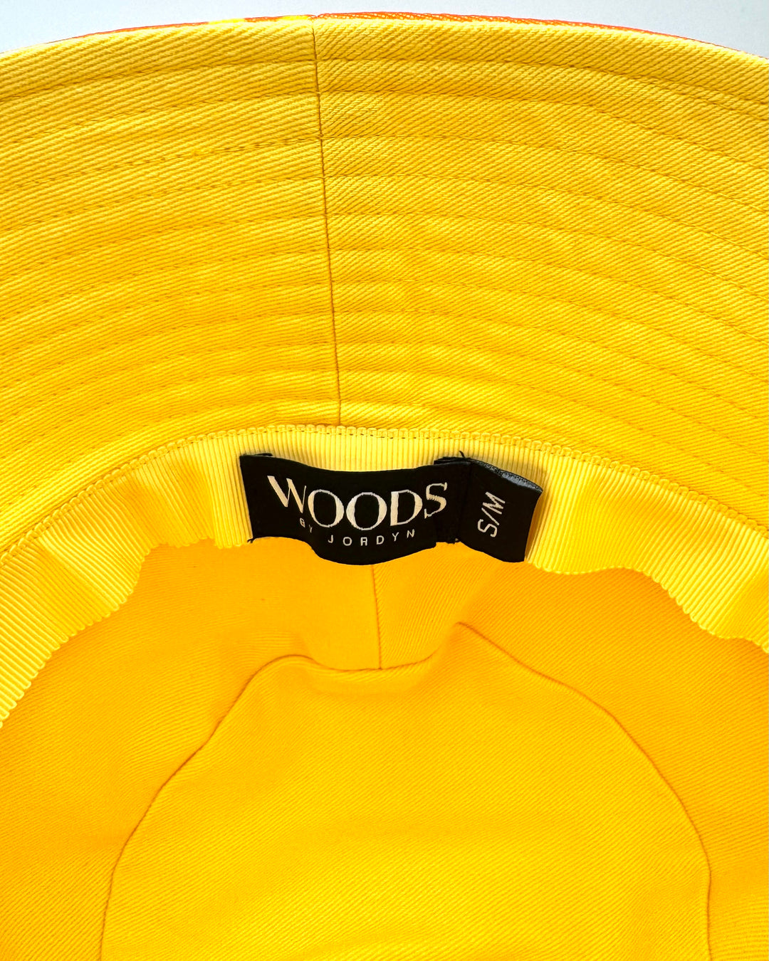 Woods By Jordyn Woods Orange And Yellow Bucket Hat