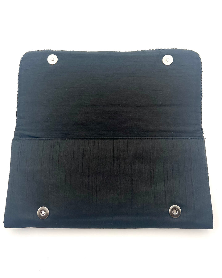 From St. Xavier London Convertible Clutch