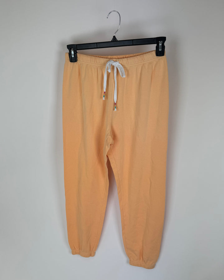 Pastel Orange Joggers - Size 2-4