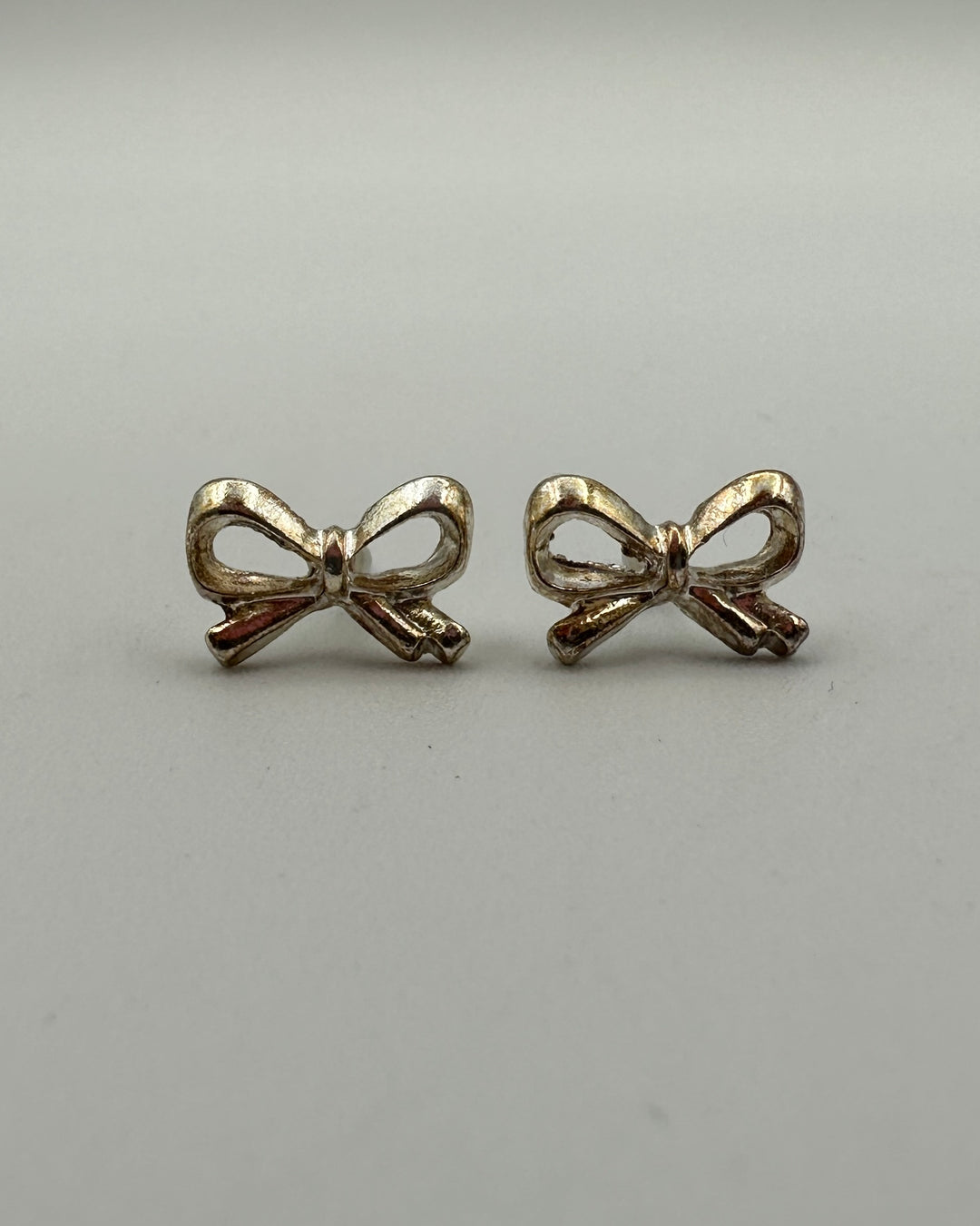 Golden Bejeweled Bow Stud Earrings