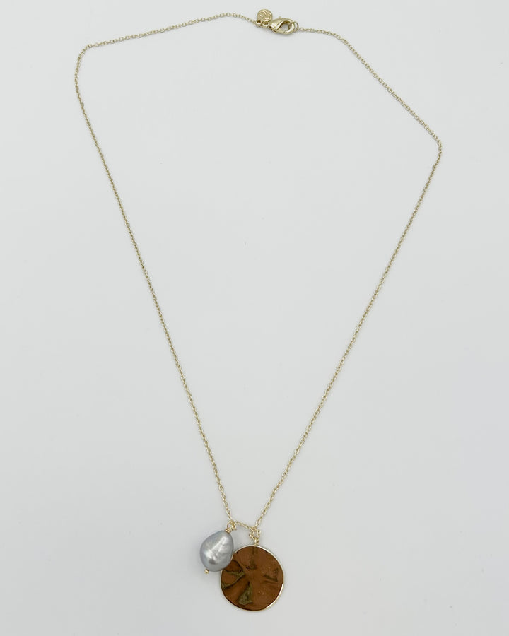 Gold Necklace with Circular and Pearl-Like Charm