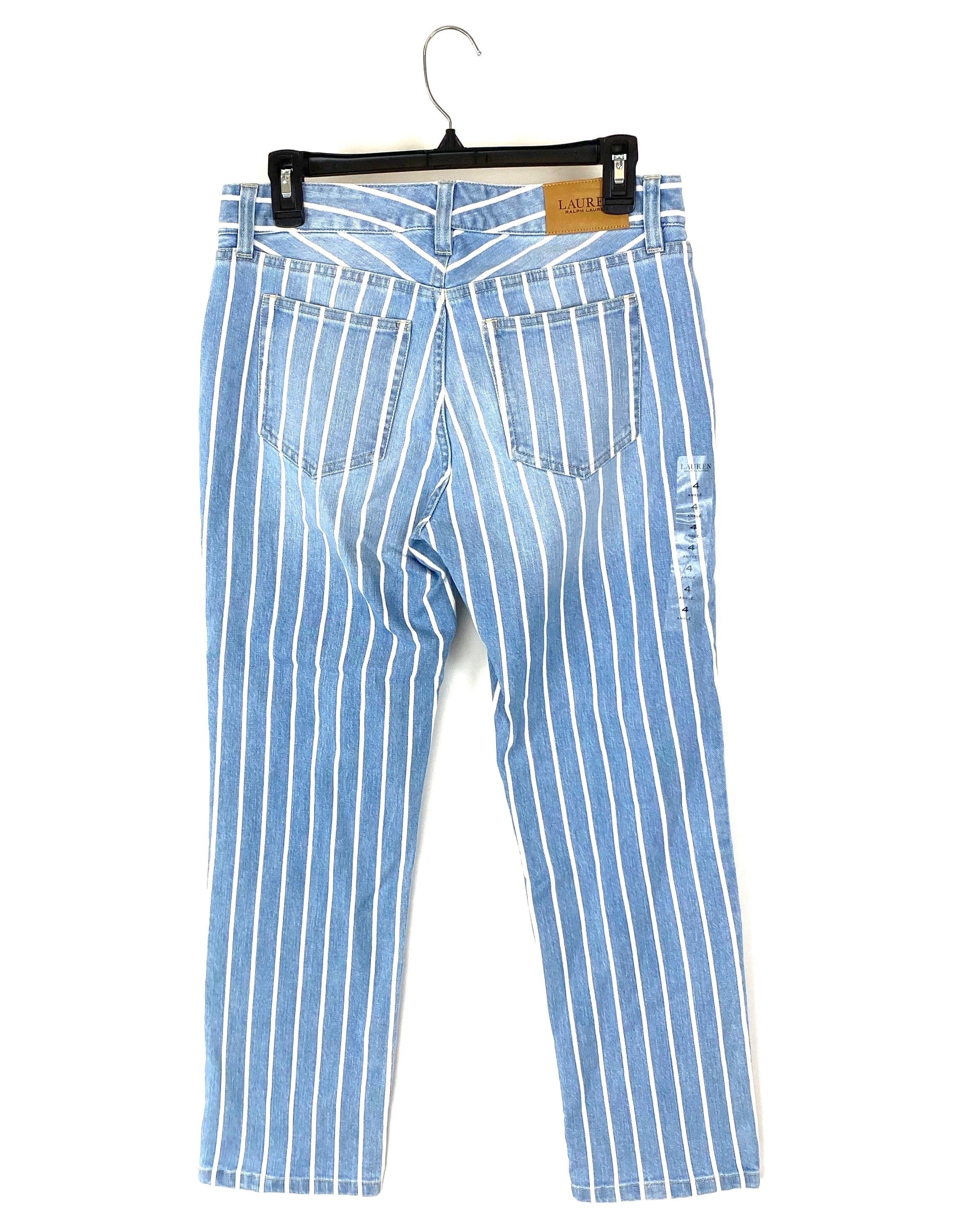 Light blue jeans with white fashion stripe